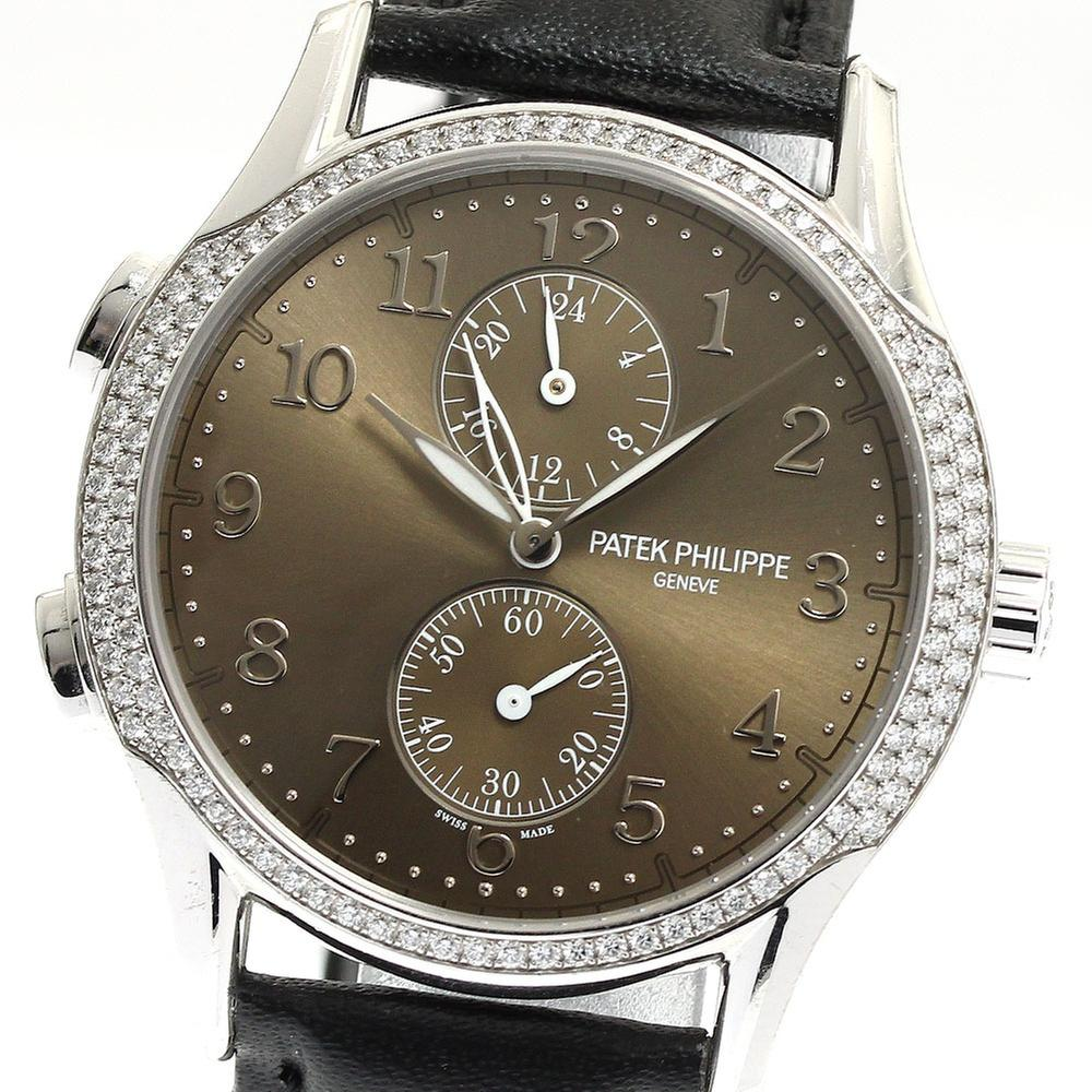 Patek Philippe Travel Time 7134G | 35 mm, Used (Fair) — Switzerland